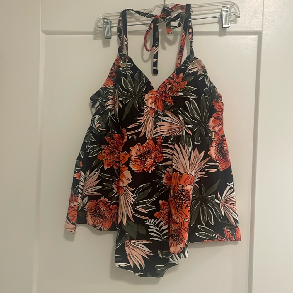 Kona Sol, black with floral print tankini, halter tie and straps for support.